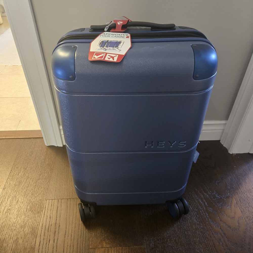Heys Navy Spinner Carry On Luggage